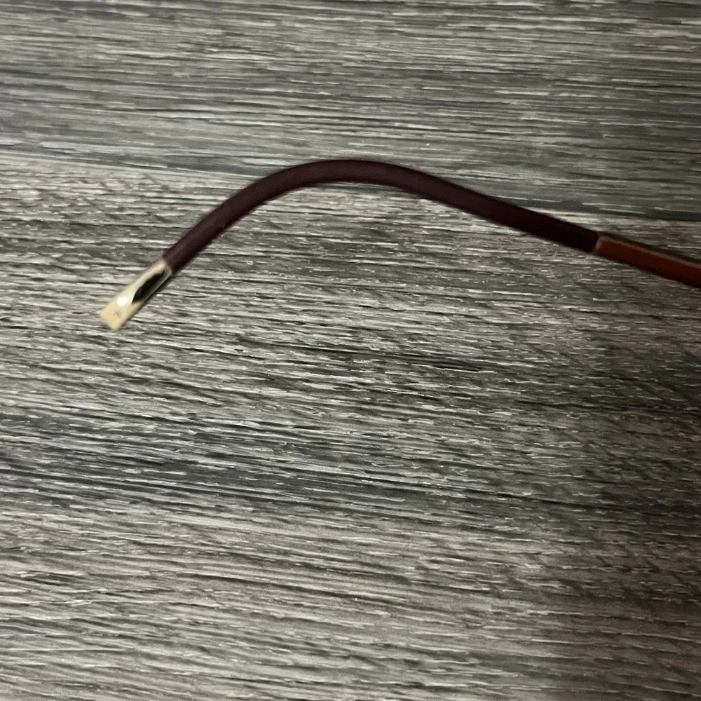 Silhouette Rimless Titanium SPX Frames 7642 40 6055 Brown Burgundy 17x135